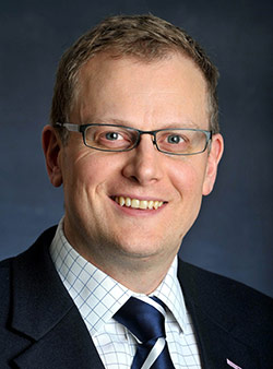 Portrait of Stuart Dean, Director of Corporate Providers and Market Oversight