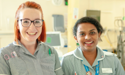 photo of two smiling nurses