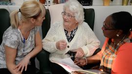 3 women talking in a care home